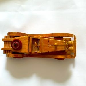 Miniature vintage wooden sports car